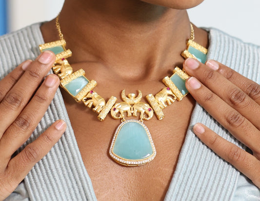 Haati Mere Saathi Gold and Turquoise Necklace and Earrings