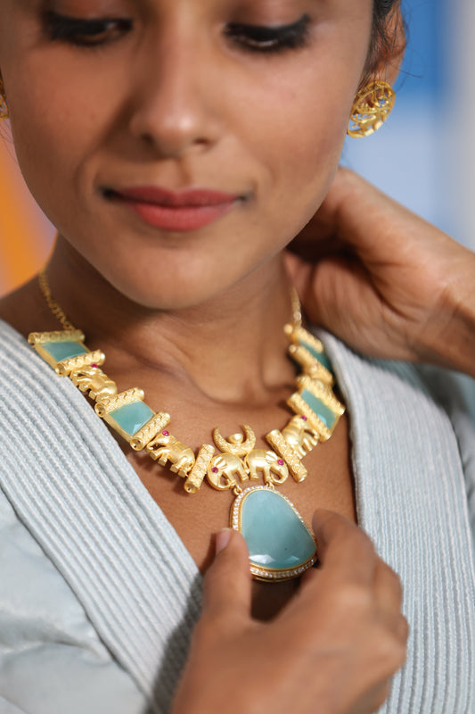 Haati Mere Saathi Gold and Turquoise Necklace and Earrings